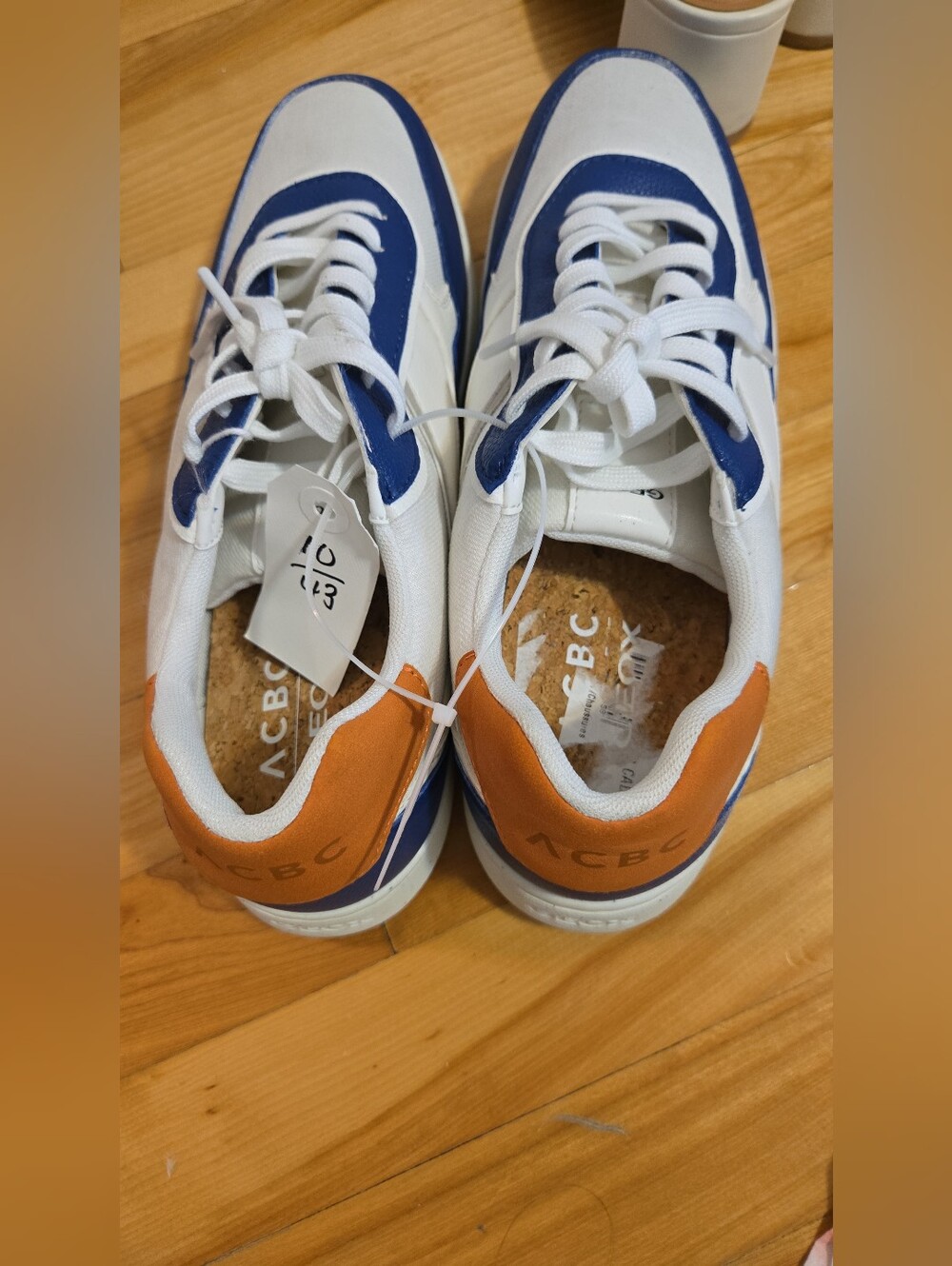Geox White Sneakers with Blue Accents and Orange Heel Tabs